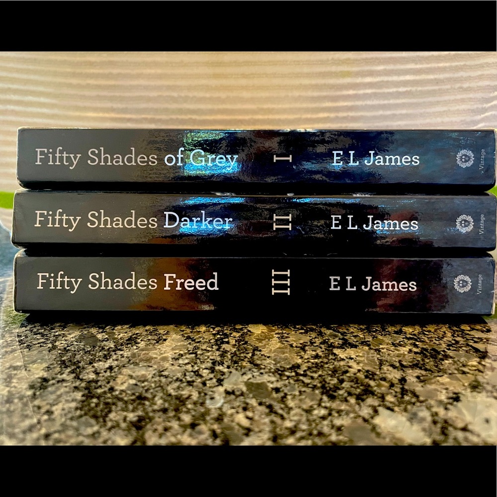 Fifty shades of grey series. by: E L James